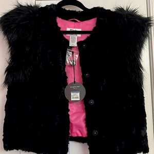 Brand new with tags Black Fur Vest.  Gorgeous dressed up or down.